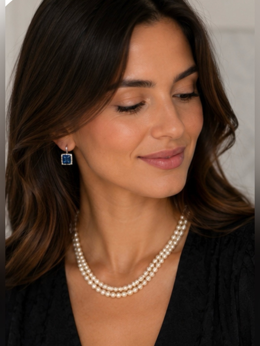 Double strand pearl necklace with ornate clasp